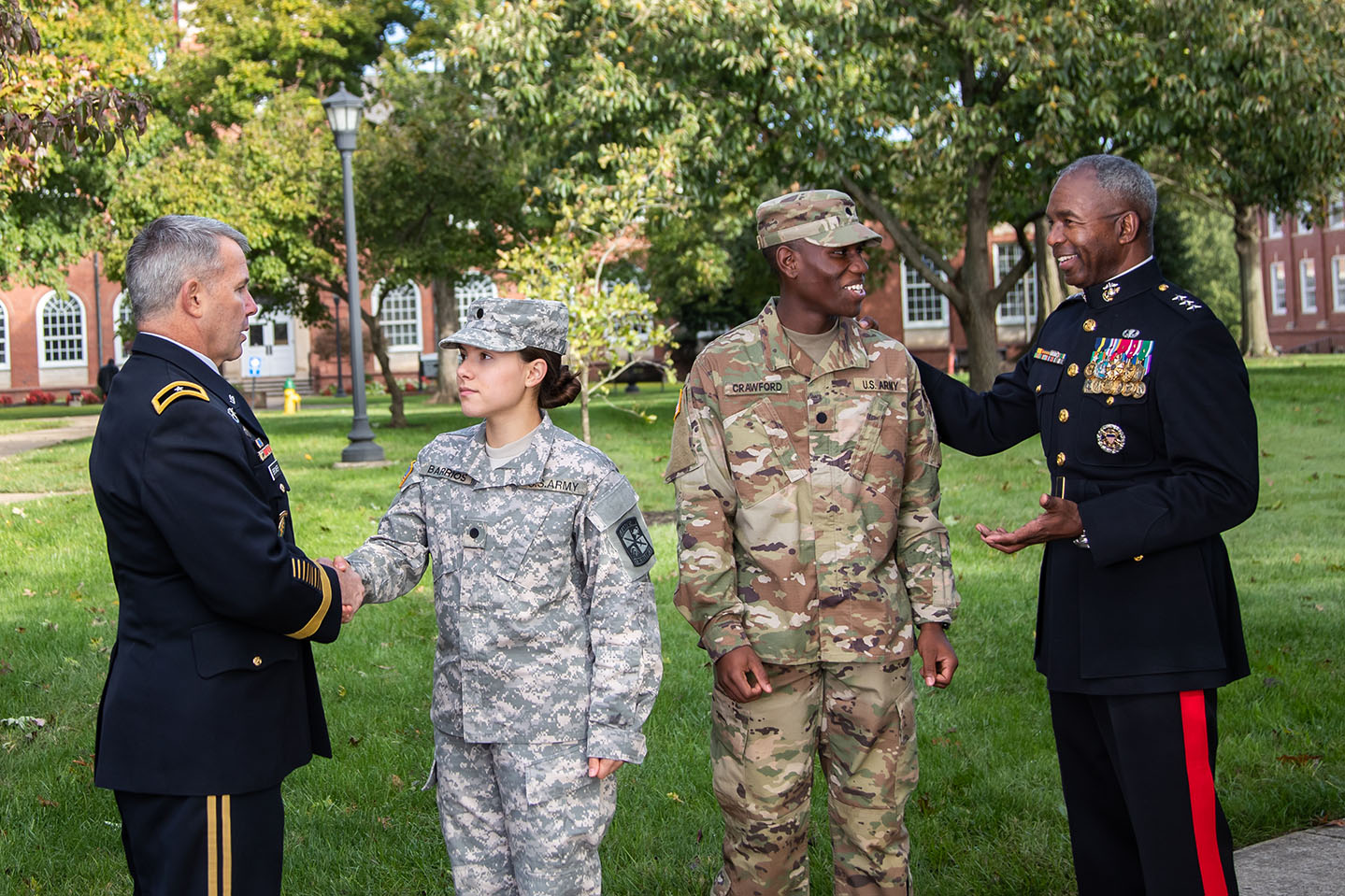 University generals pose with ROTC cadets