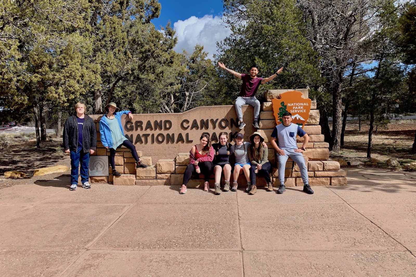 Students who went on the Grand Canyon trip were, from the left, Cody Bricker, Rebecca Thomack, Anaelle Maudet, Annabelle Spencer, Goodwin Brown, Alex Arriaga (on sign), Gwynevere Cardinal and Luis Soto.