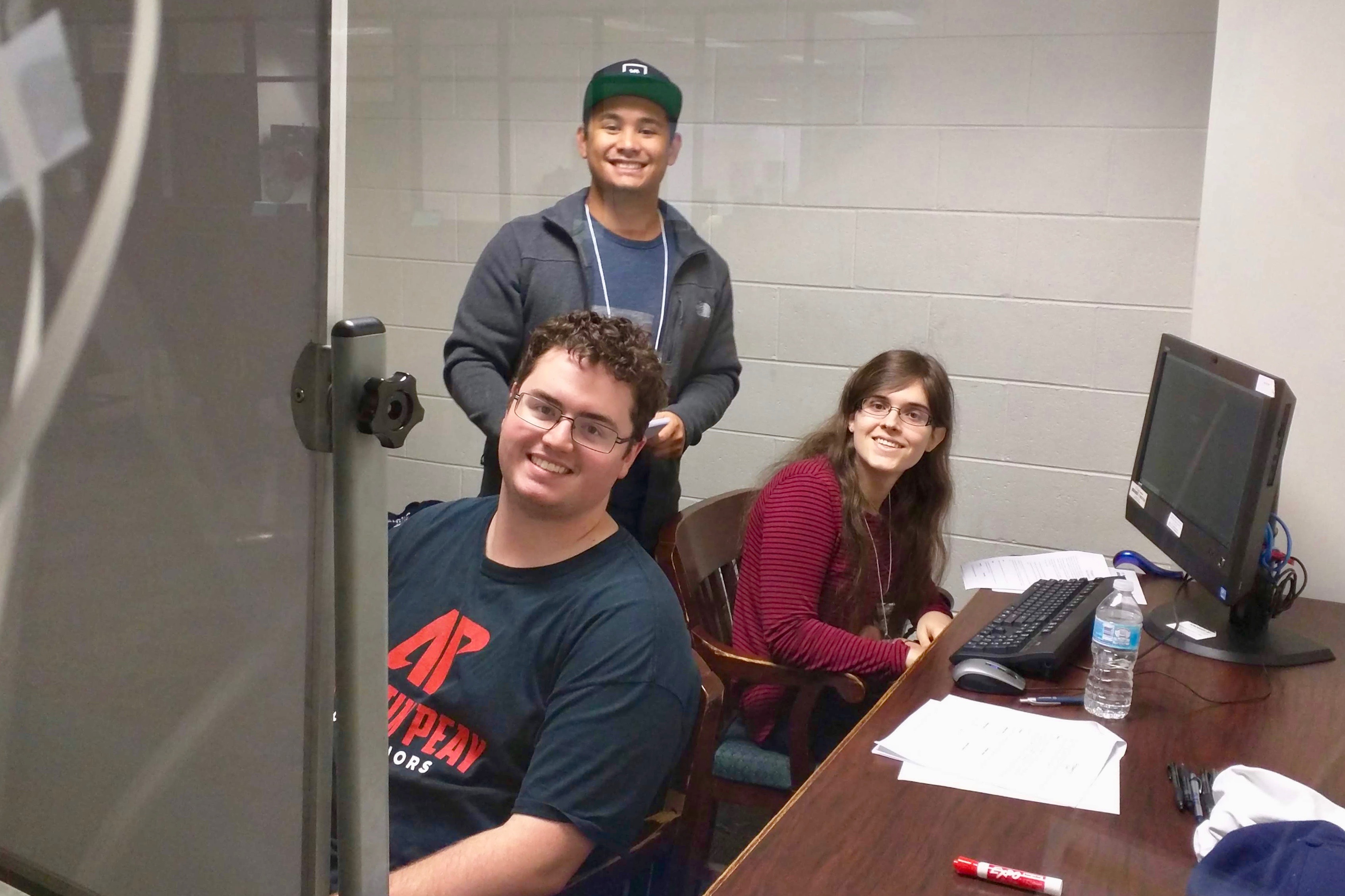 Harrison Welch, front, Chris Tuncap and Lexie Nance were members of Austin Peay team “null” at the University of Tennessee at Martin site of the International Collegiate Programming Contest. The team finished second at the site. - photo by Dr. James Church, APSU
