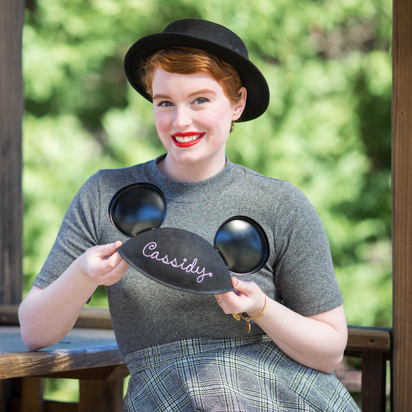 Cassidy with a disney cap in her hand