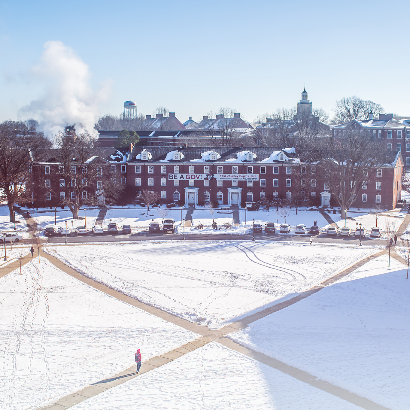 Aerial shot of the campus quad covered in snow.