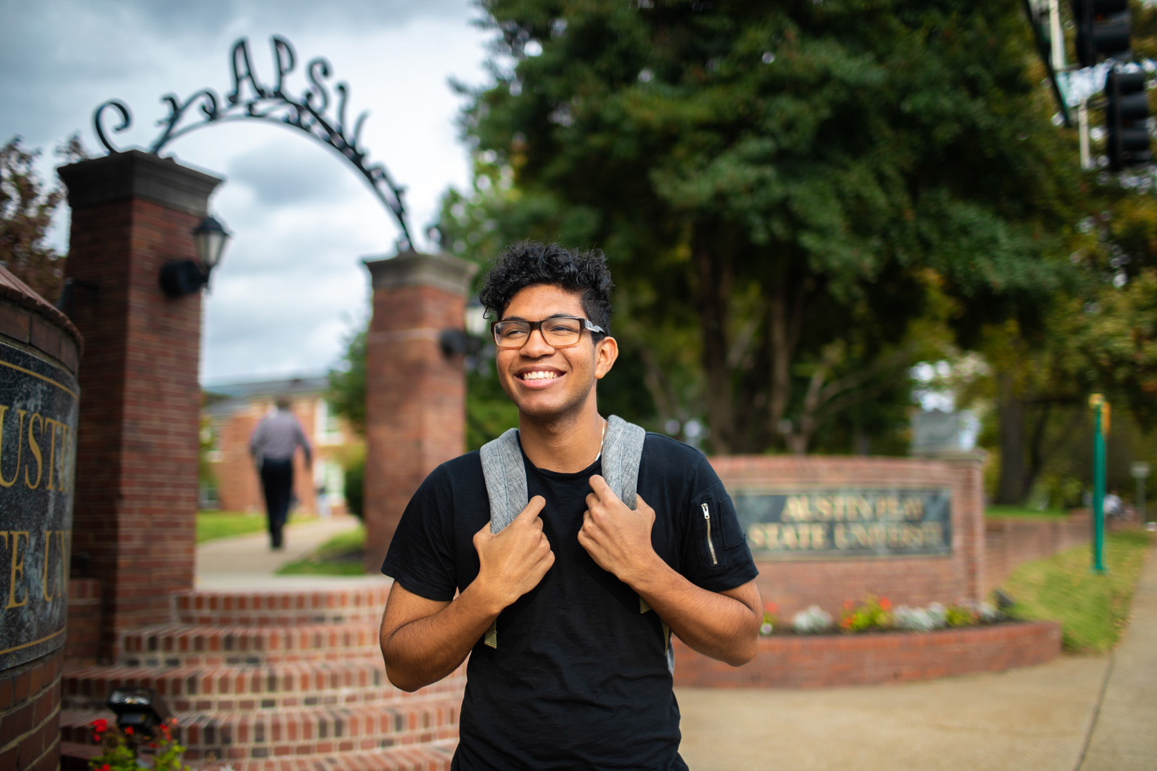Student walks out of main entrance