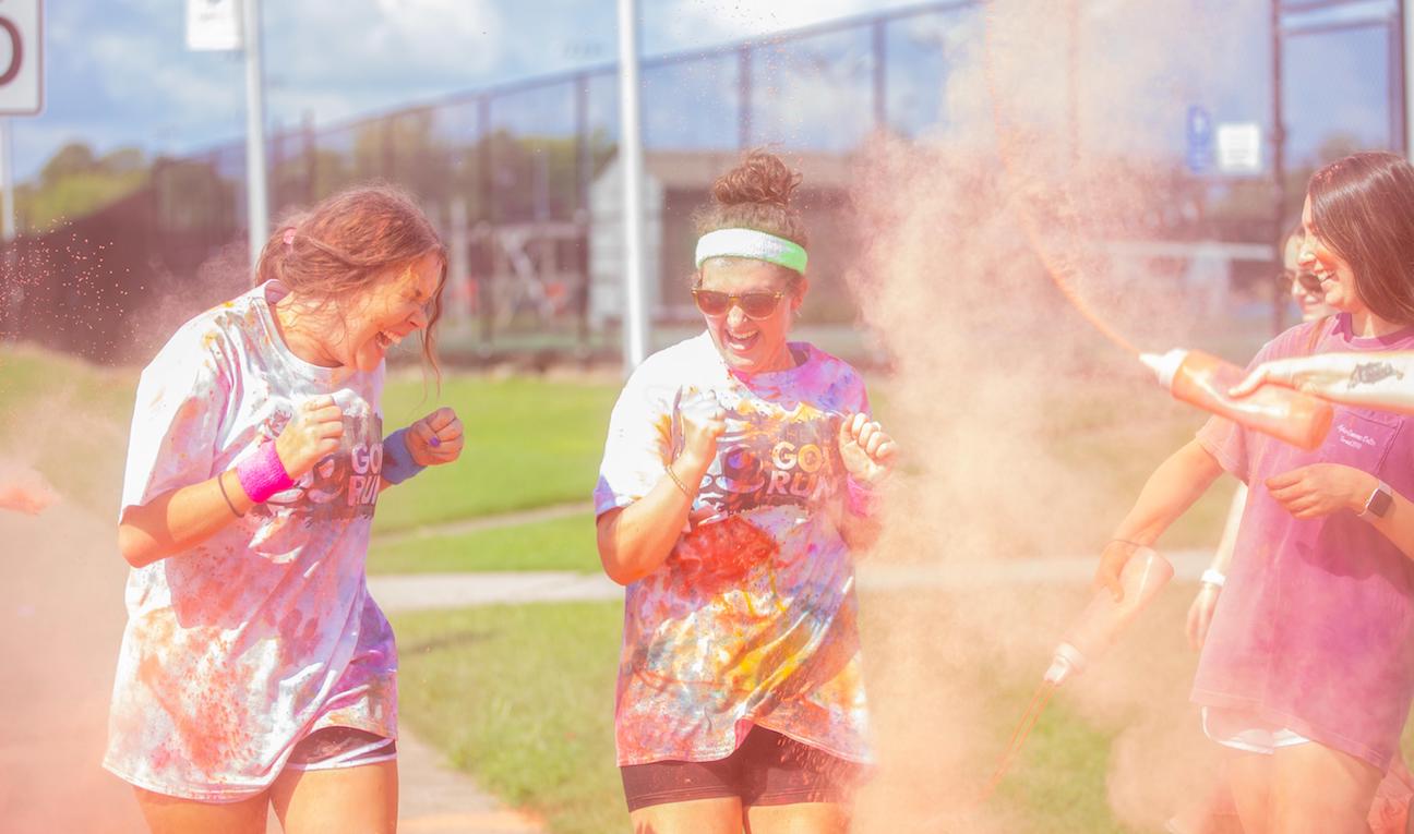 Students run during the Gov Run, part of APEX Weekend.