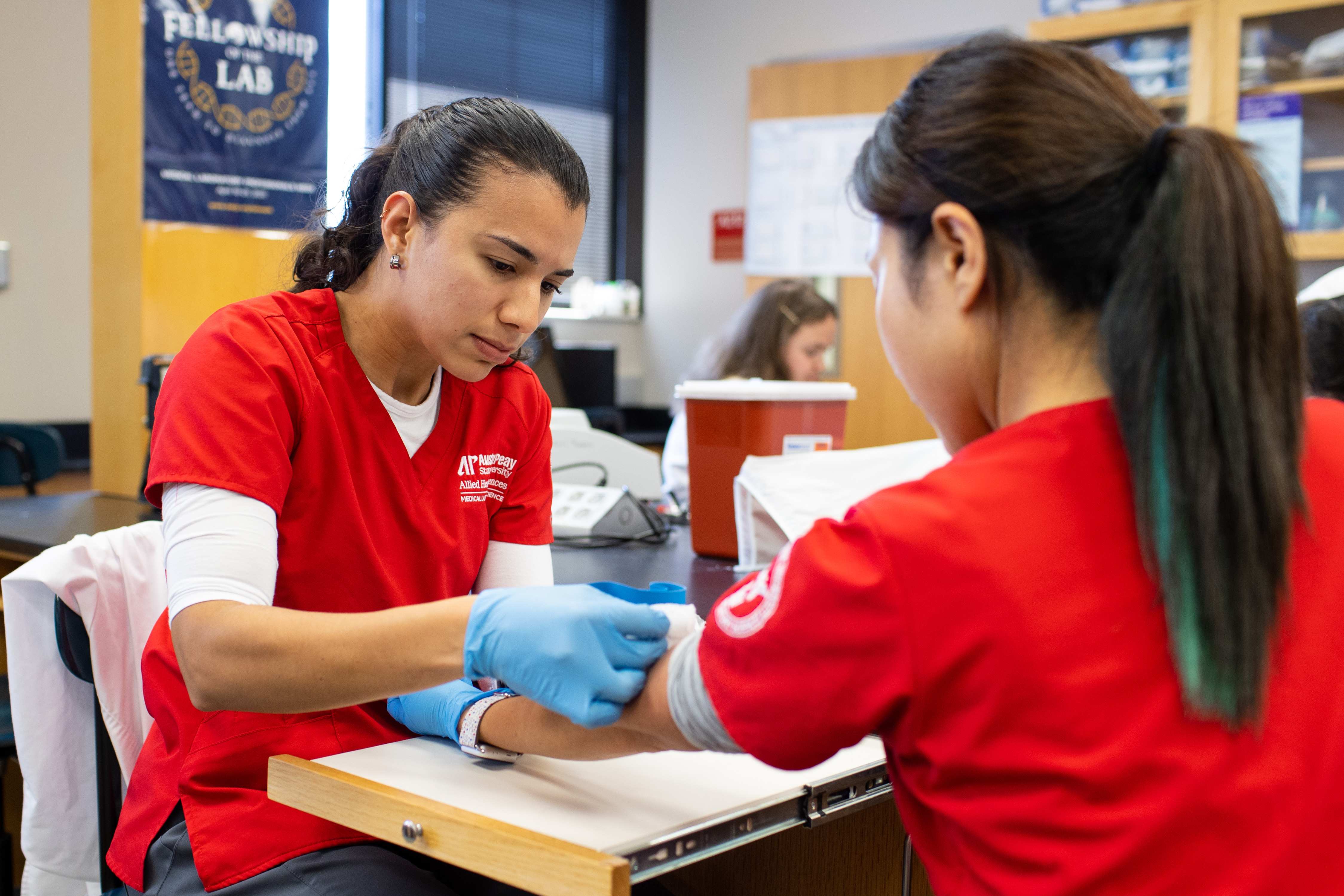 Allied Health Sciences students practiced taking blood samples during Professor Jane Semler’s Medical Technology 4971 class on Tuesday, Sept. 13. 