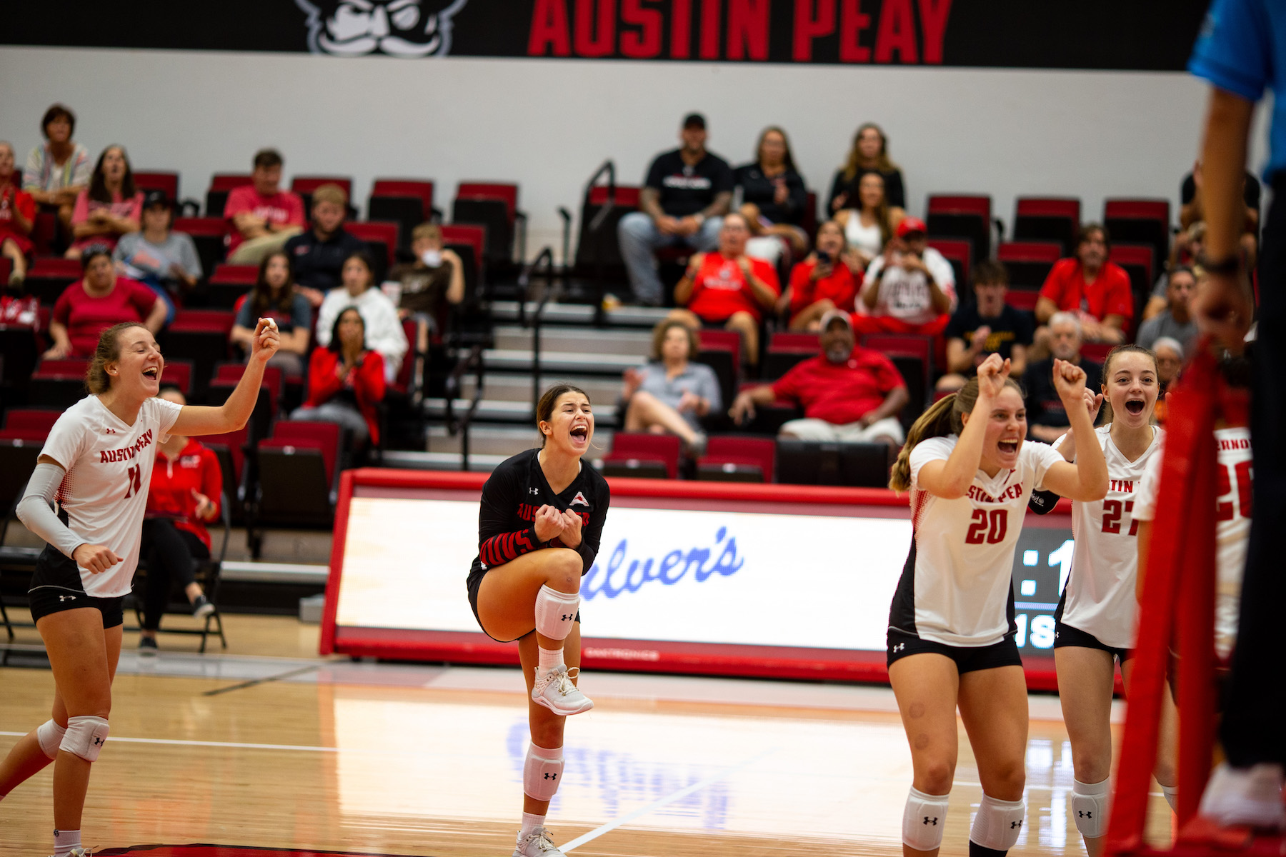 The Govs volleyball team celebrates a successful set during their 3-1 victory over North Dakota State University on Friday, Sept. 16. Ally Shemwell | Intern