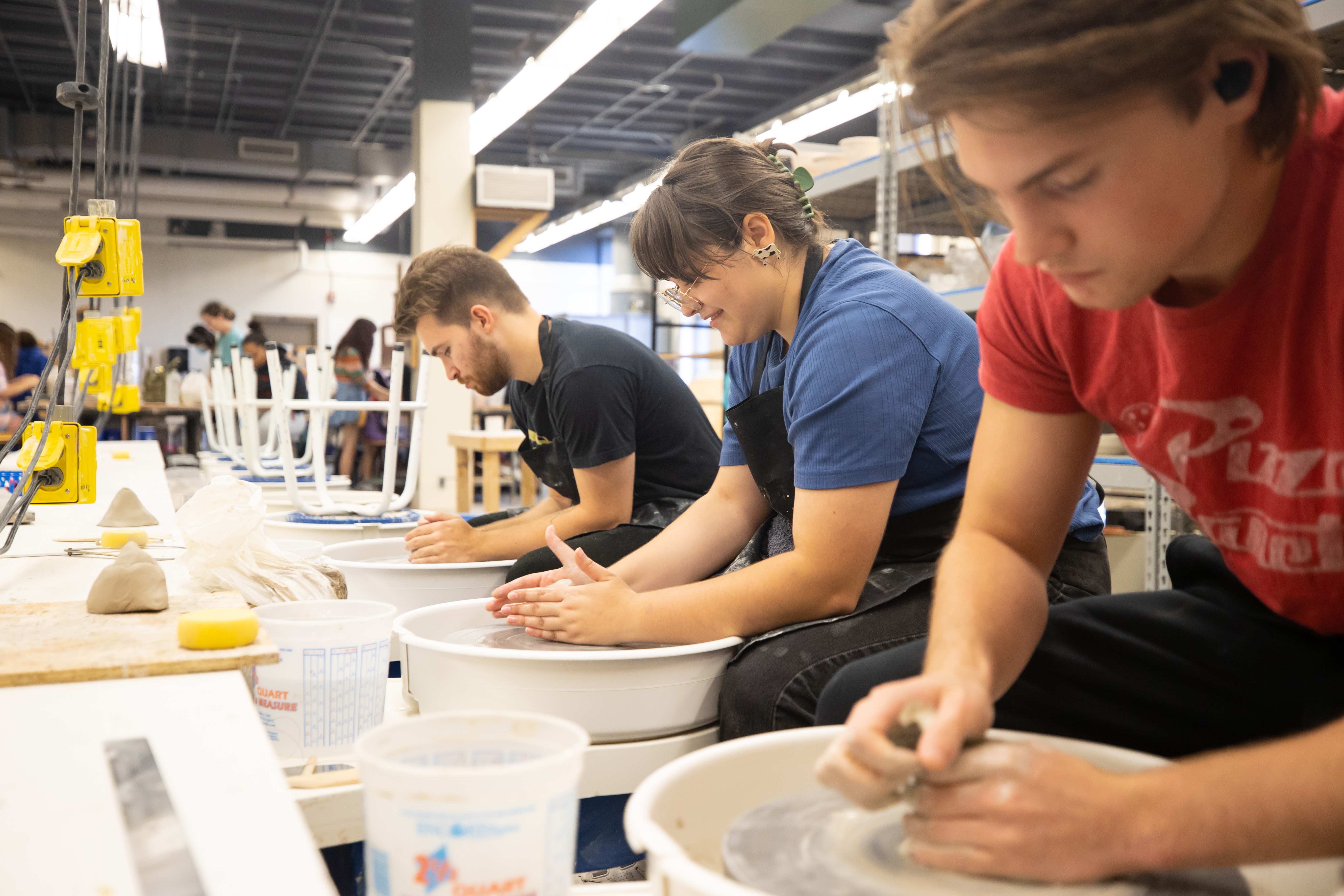 Students in Assistant Professor Wansoo Kim’s Ceramics class practiced wheel throwing in the Trahern Ceramics Studio on Tuesday, Sept. 13. Sean McCully | University Photography and Videography Coordinator