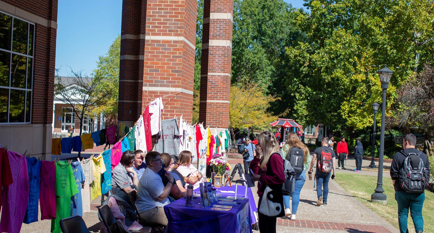 Austin Peay hosted the Clothesline Project on Wednesday, Oct. 5, to increase awareness of the impact of violence and abuse, honor survivors’ strength and give survivors an avenue to break the silence that often surrounds such violence.
Organizers dedicated the exhibition to Dr. Jill Eichhorn – a longtime professor at Austin Peay who died suddenly after a short illness on Oct. 2. As a sign at the exhibition noted, Eichhorn was a warrior for gender equality and nonviolence, and was a friend and adviser to all.
Donations were accepted in Eichhorn’s name to benefit the Legal Aid Society of Middle Tennessee.
The exhibition was hosted by Austin Peay’s Govs Care, and the Clarksville Area urban Ministries SafeHouse provided information about services for interpersonal violence survivors.