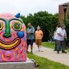 Visitors and campus members viewing the installation.
