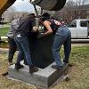 Final adjustments to the sculpture pedestal.