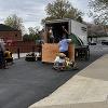 Unloading the sculpture components.