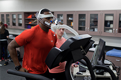 Student runs on treadmill