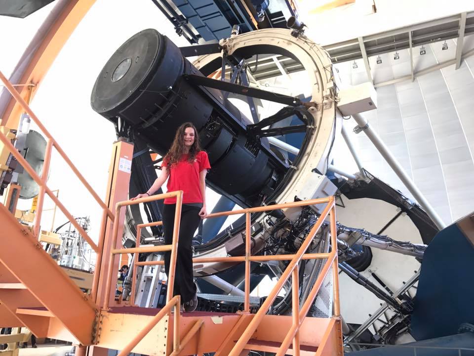 Deborah poses with telescope in Chile