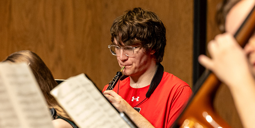 Student playing the oboe.