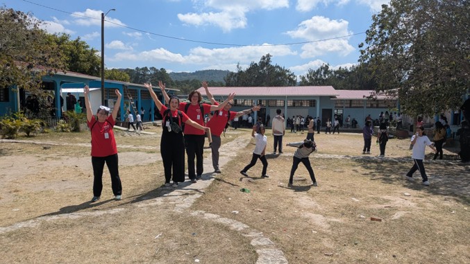 Playing in the courtyard of a school after a demo show in Honduras