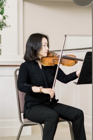 Eunice Lee playing violin