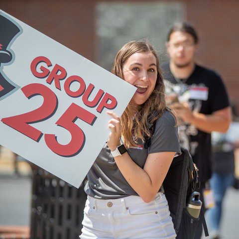 Peer Leaders leading orientation group on a tour of campus