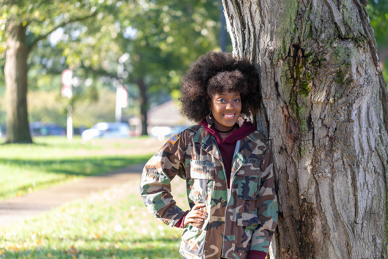 Erica Harris poses for photo on Browning lawn