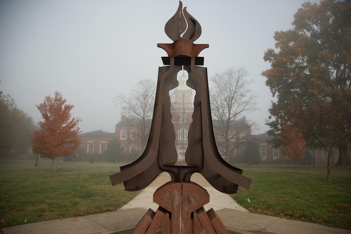 Front shot of campus in the fog.