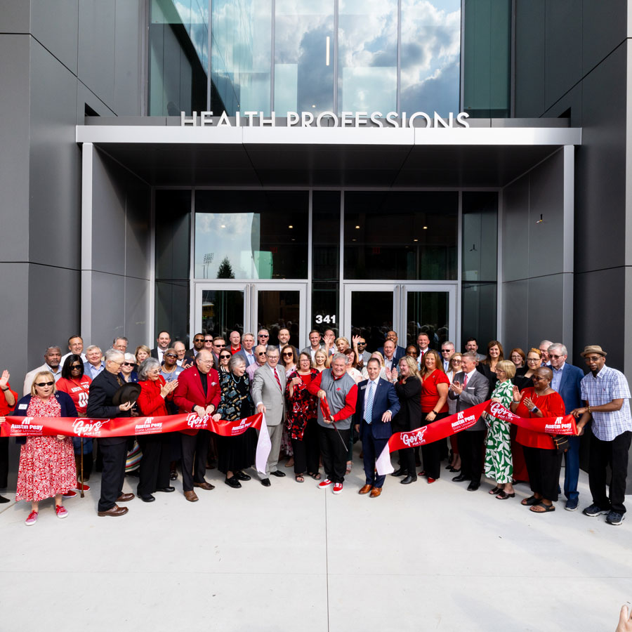 Ribbon cutting ceremony celebrating the opening of the Health Professions Building