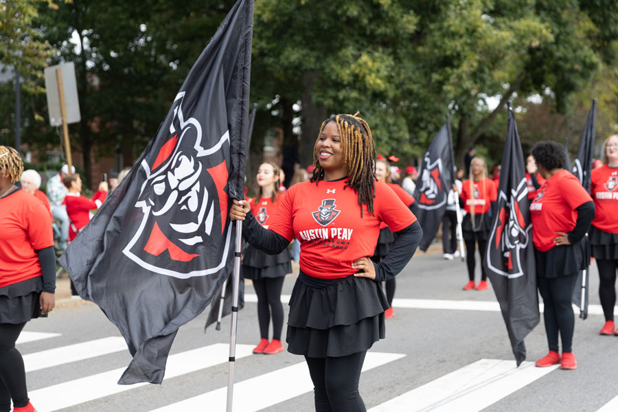 Color Guard marching in the Homecoming Parade.