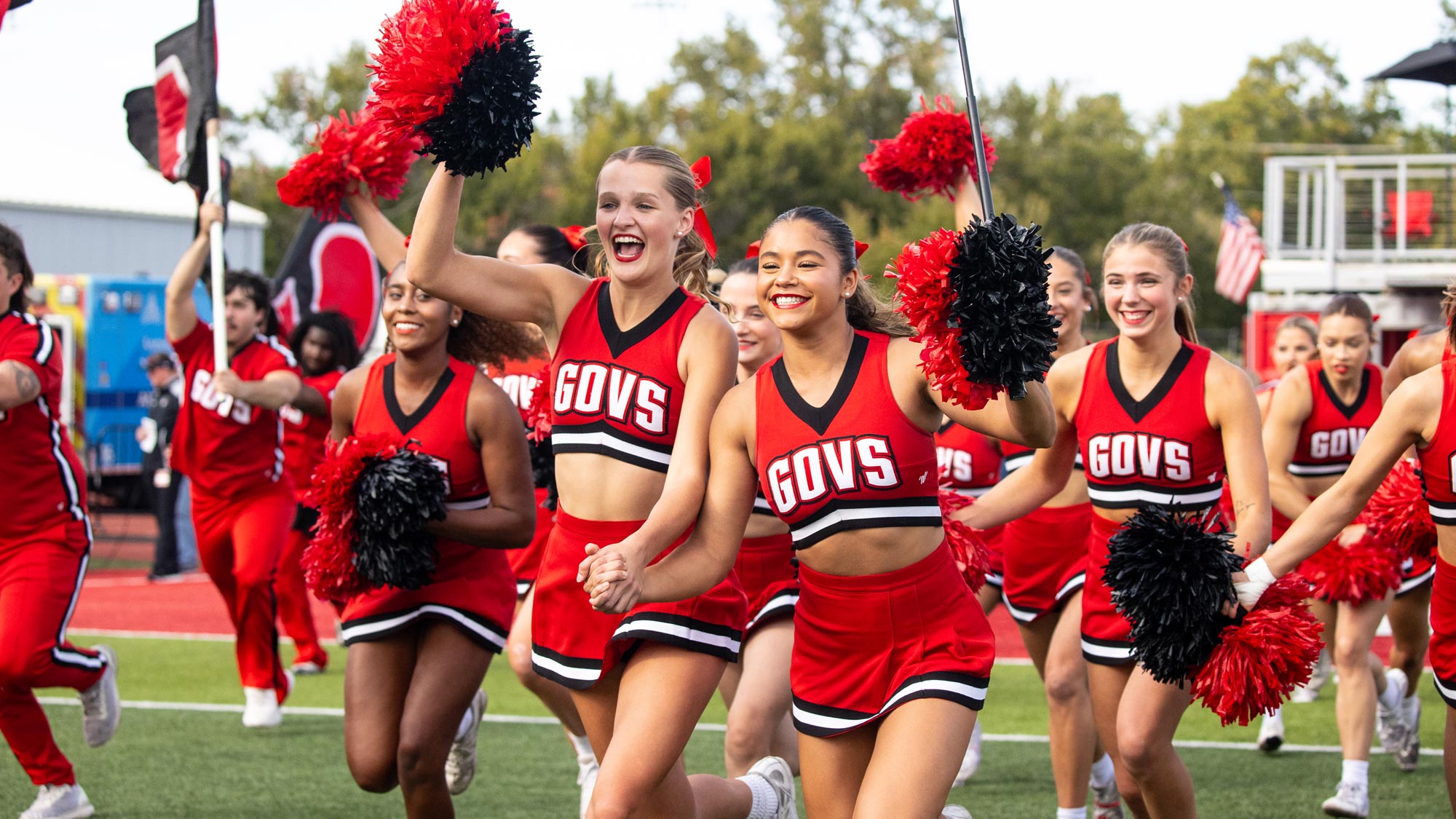 APSU Cheerleaders run onto the field before the game.
