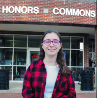 Picture of Ari Lawrence in front of the Honors Commons
