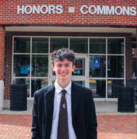 Picture of Isaac Billeter in front of the Honors Commons