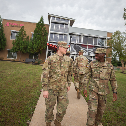 Military students walking in front of the Austin Peay Center at Fort Campbell