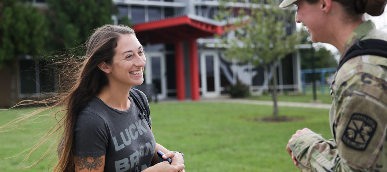 Students talking outside of the Fort Campbell Center