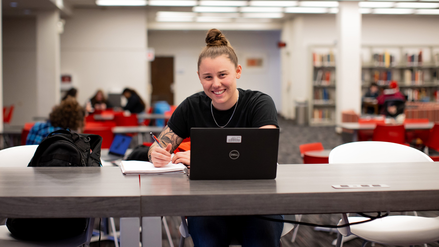 Student studying in the Library