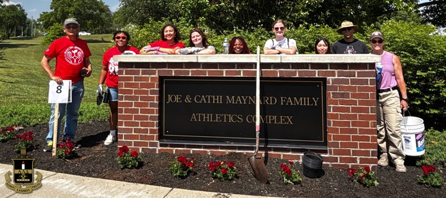 Members of Alpha Lambda Delta participating in Plant the Campus Red. 