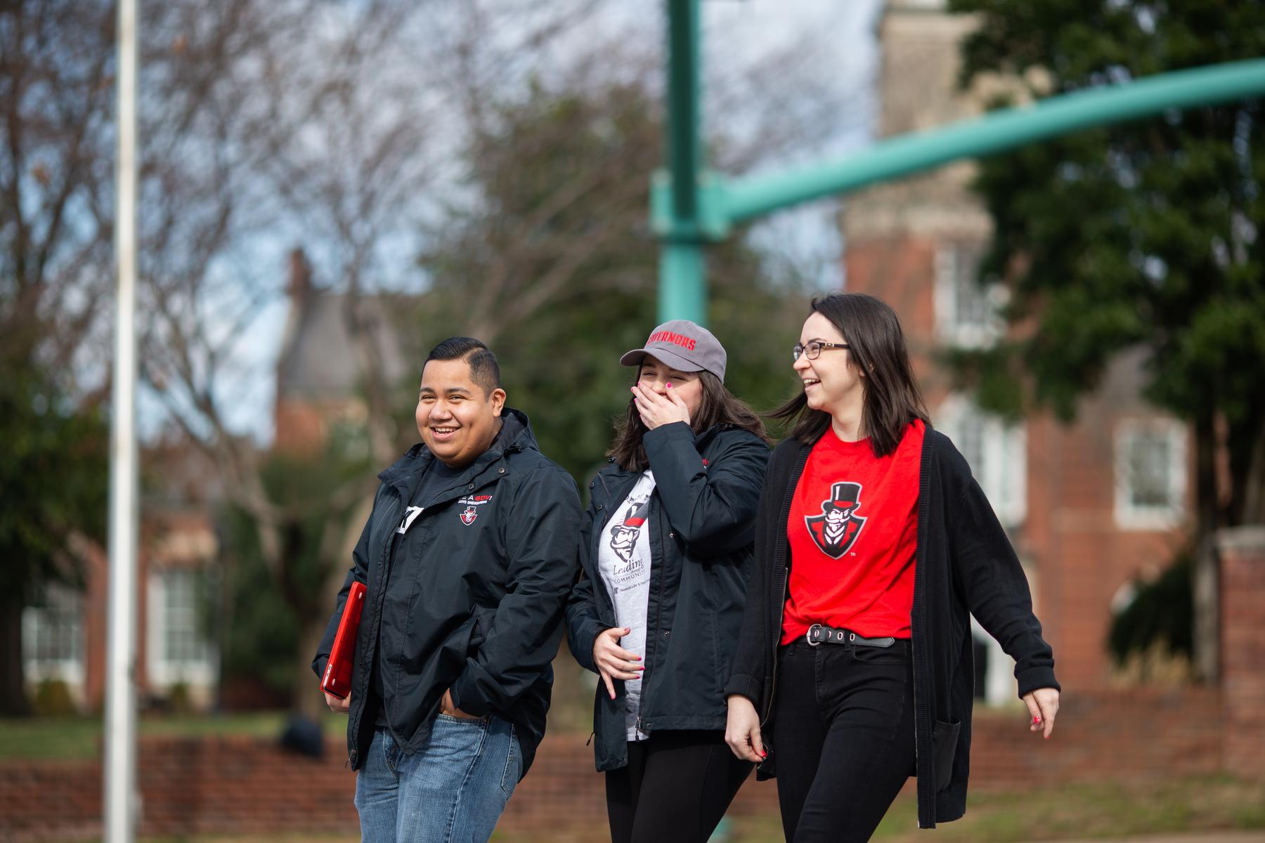 APSU students share a laugh while walking across campus.