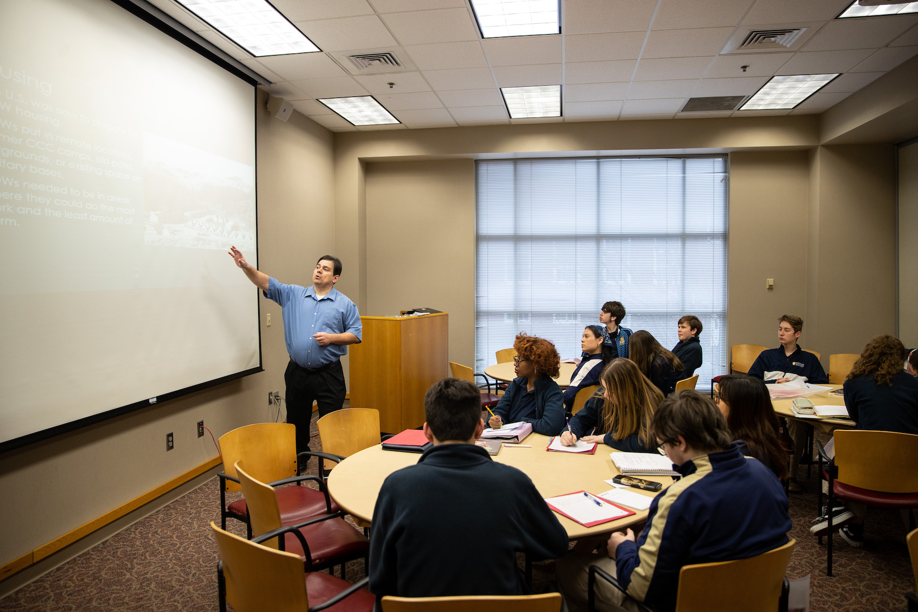 Dr. Antonio Thompson, professor of history and philosophy, gives a lesson to visiting students from Day Springs Academy. 