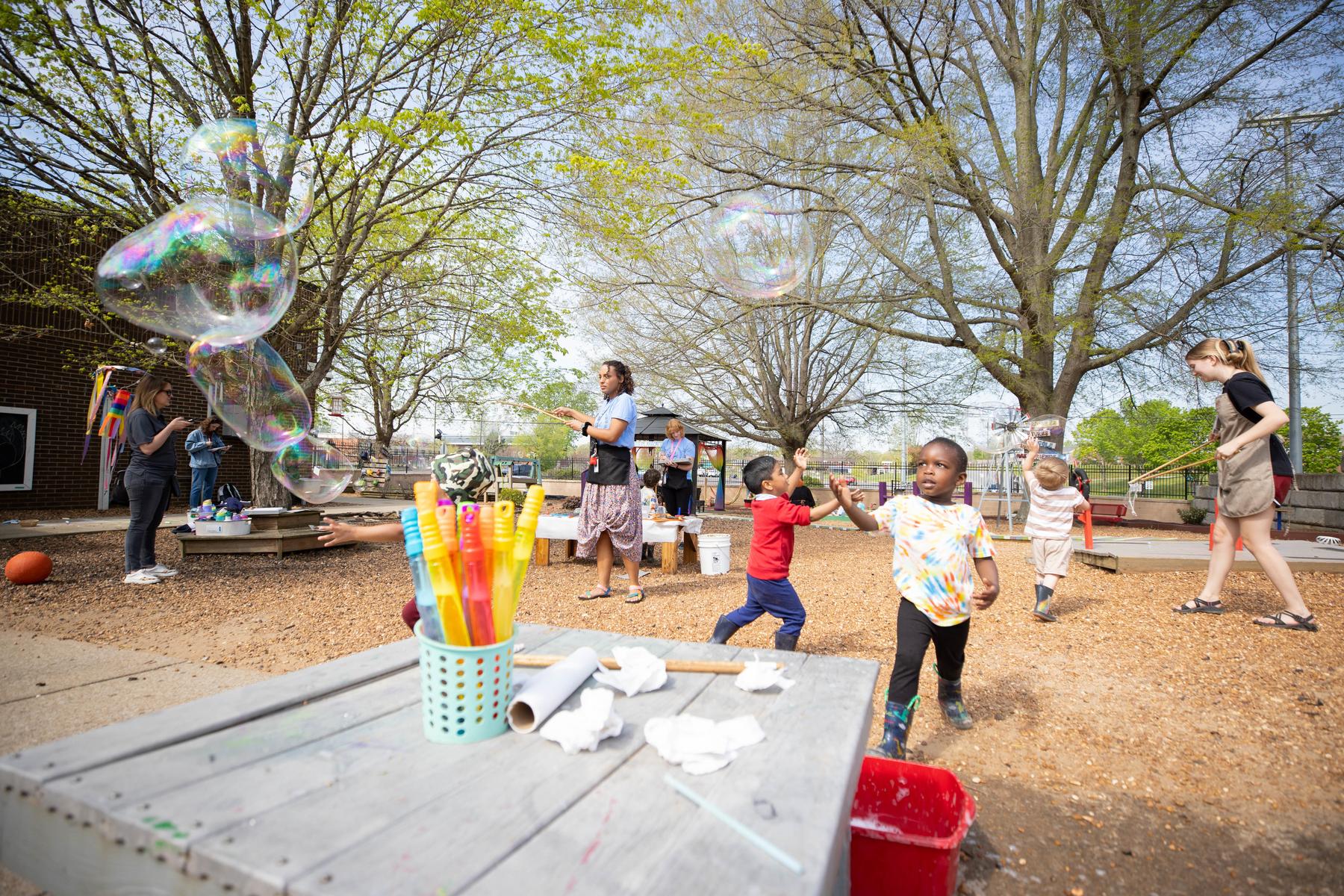 Children immerse themselves in the Little Govs Child Learning Center’s outdoor play space, which was designed to encourage exploration and learning. | Photo by Madison Casey