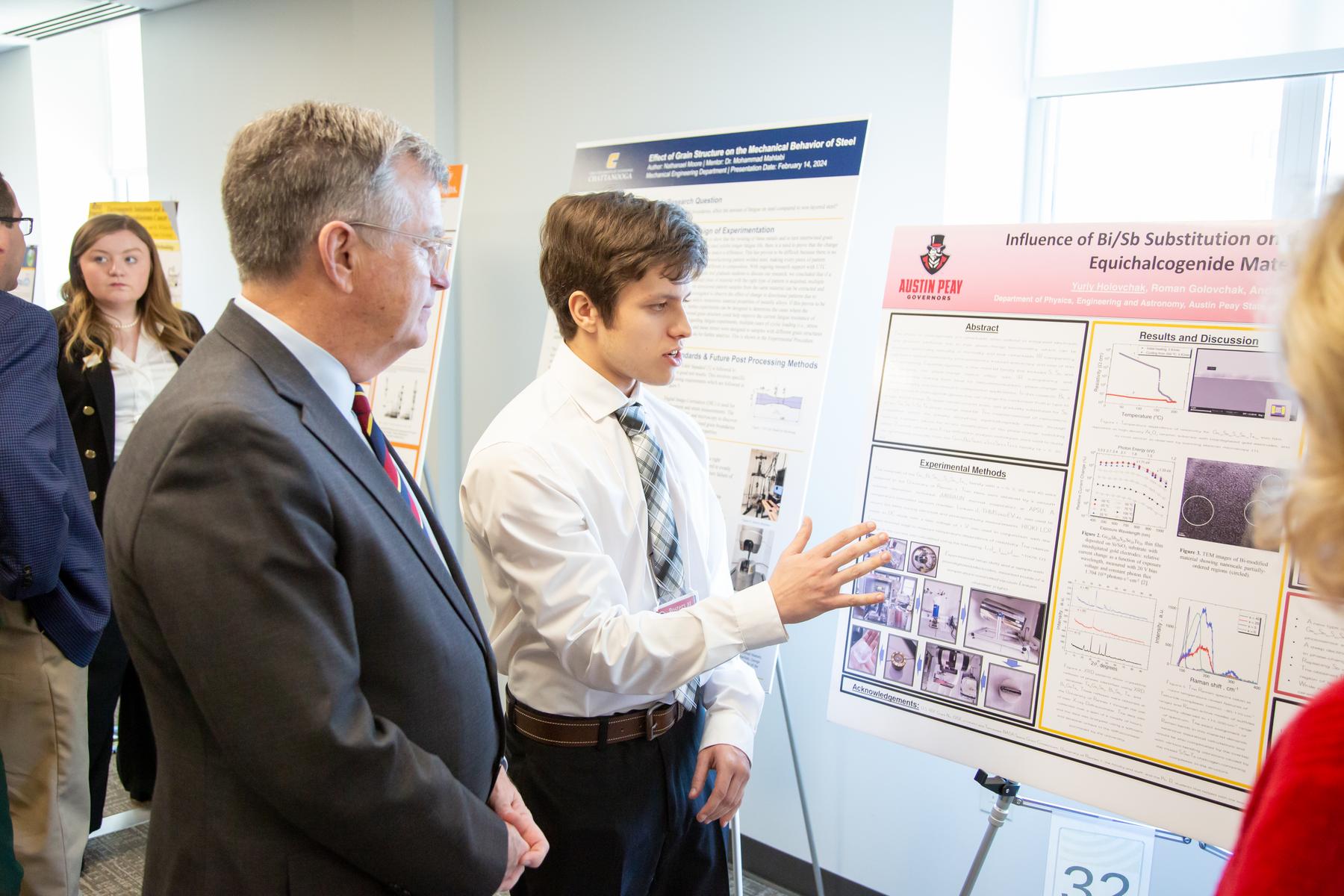 APSU student Yuriy Holovchak presents research to state Sen. Bill Powers on Feb. 14 during Posters at the Capitol.