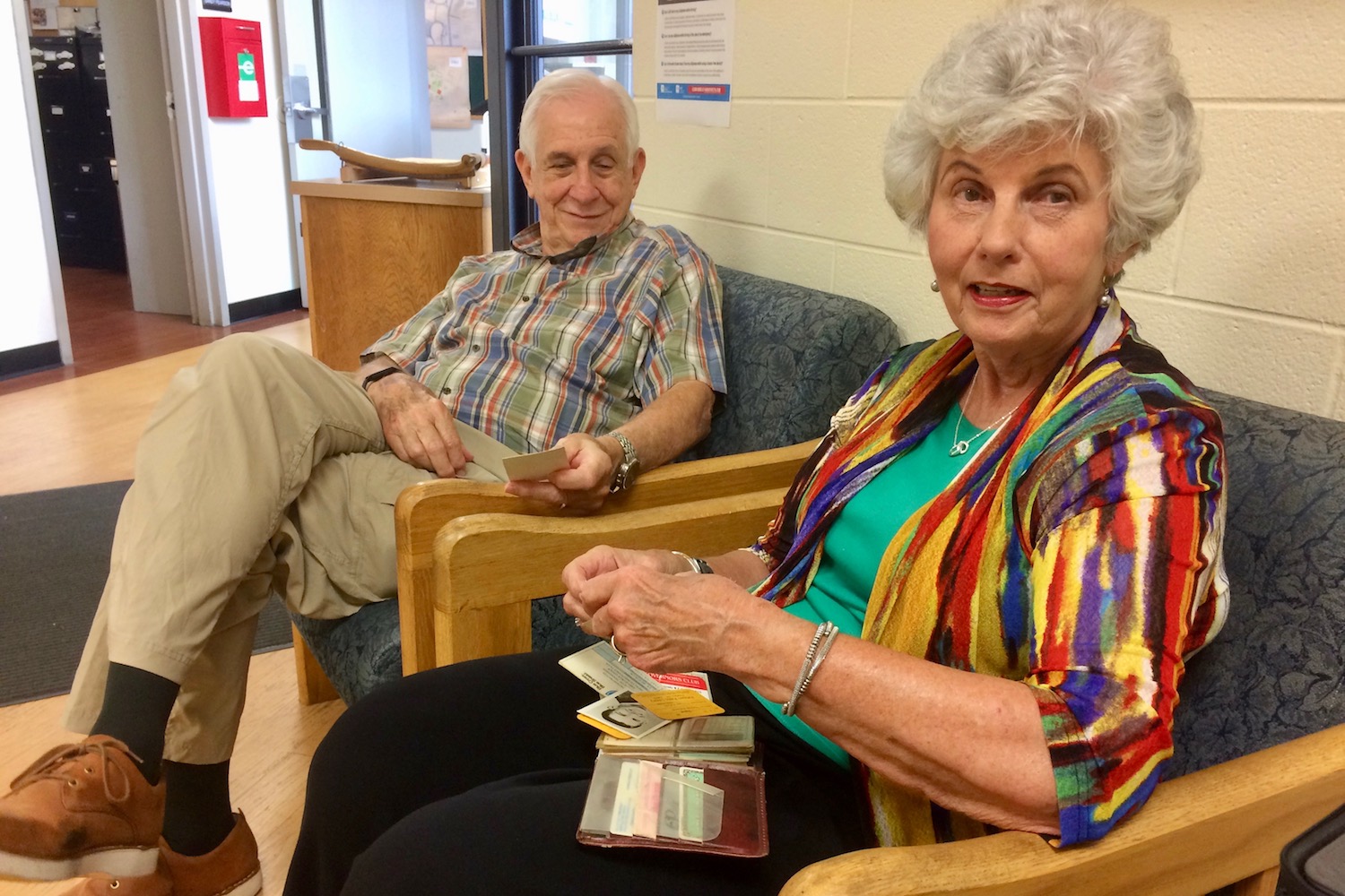 Drs. Harriet and Leon McQueen look through the billfold’s contents, untouched for nearly 32 years.