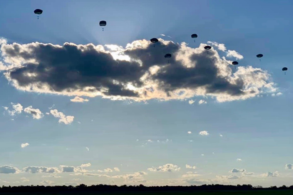 A photo provided by Fine showing students jumping during Army Airborne School.
