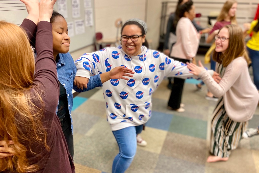 West Creek Middle students laugh as they try to choreograph a dance.