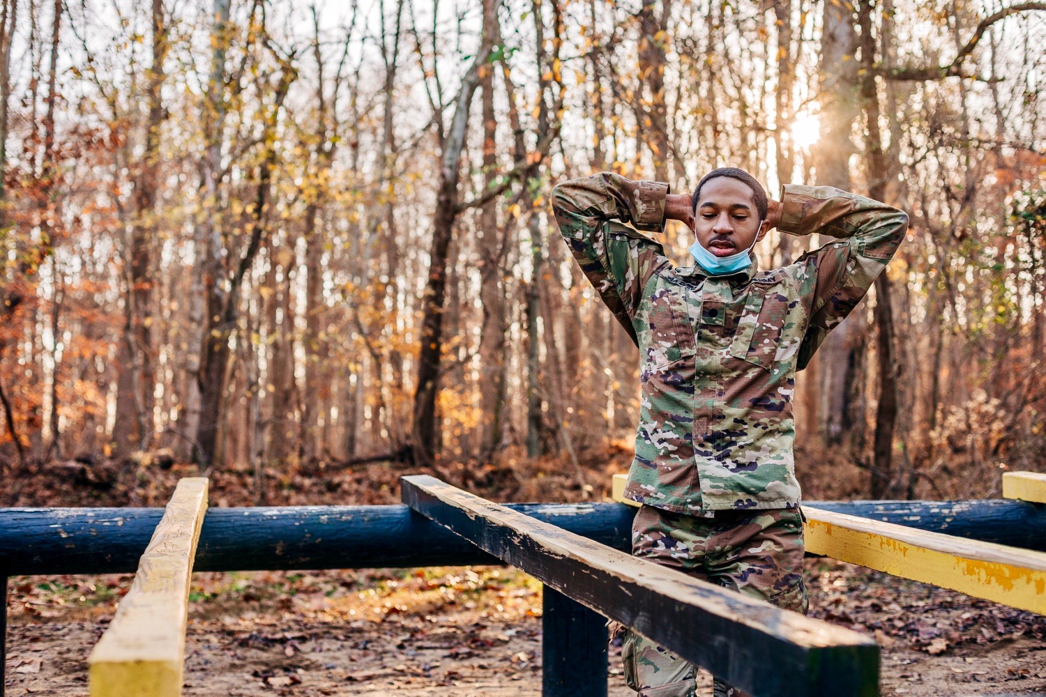 Junior cadet Devin Antoine negotiates the “leg over” at the Air Assault School obstacle course.