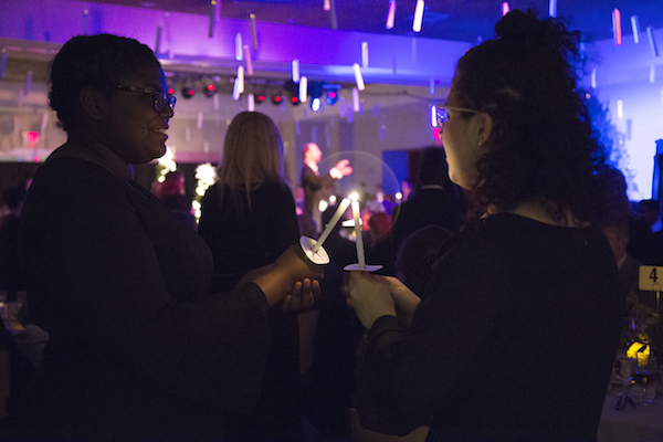 Students hold candles during last year's APSU Holiday Dinner