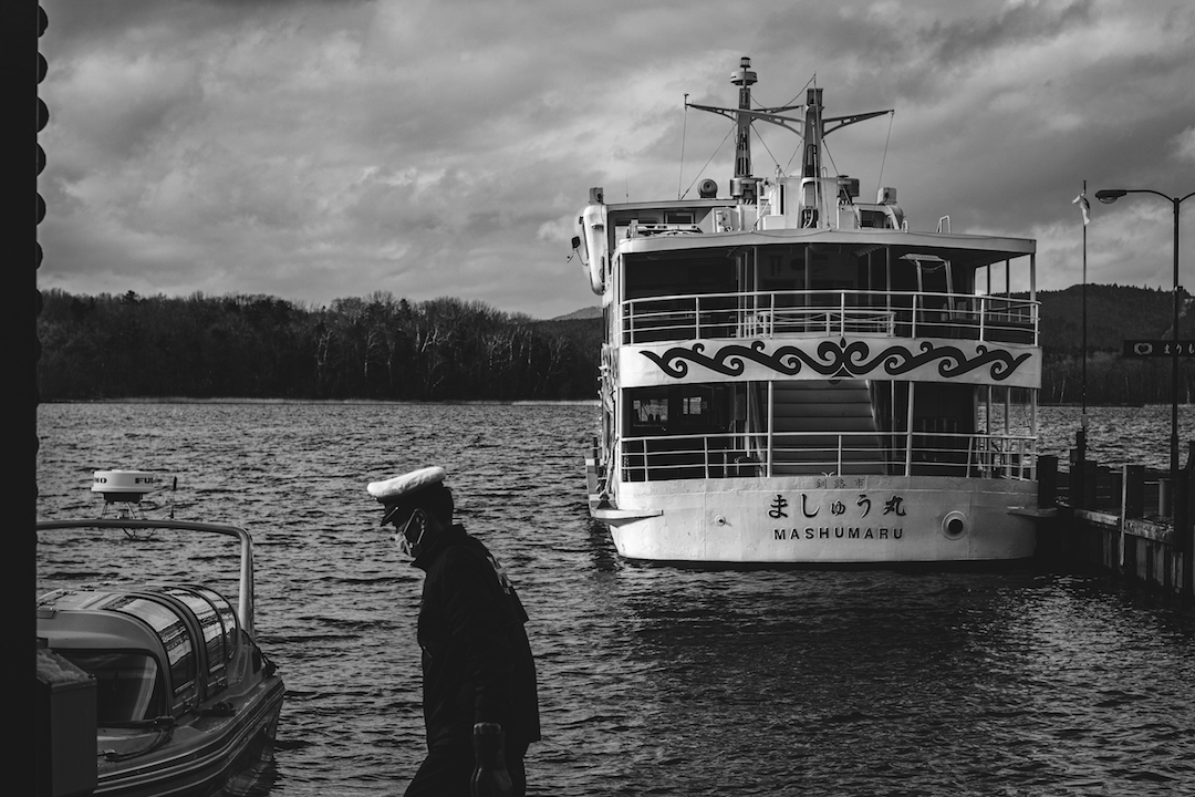Justin Randall was out having dinner at a local Irish Pub when the island of Hokkaido declared a state of emergency. “We didn’t know what that quite looked like,” Randall said. Randall is an Austin Peay State University alum who has been teaching English across 18 elementary and junior high schools in Kushiro, Japan, since August 2019. Seven months into his stay in Kushiro, located in Hokkaido, Randall renewed his contract with JET, aka the Japanese Exchange and Teaching program. By signing this contract, Randall committed to at least one more year of living in Kushiro. “It wasn’t really big here until the Diamond Princess cruise,” Randall said. The Princess accounted for over half of the COVID-19 cases outside of mainland China at the time. “When it started to get bad, contracts were due for a lot of people. After the cruise ship came over, a lot of people pulled back their recontract papers.” Many of Randall’s colleagues flew back to America where they remain due to Japan closing its borders. Permanent and resident cardholders, like Randall, were not allowed to travel abroad. “That’s what really worried me. If I got sick and the worst happened and having my family have to come get my stuff, really worried me at the beginning,” Randall said. Pandemic raises distrust of foreigners “People were already wearing masks here because of flu season,” Randall said. “There’s this Japanese word for rural areas, “inaka,” and Kushiro is a big town in the middle of nowhere, so there’s a big inaka culture here. There’s not really a lot of foreigners. I’m one of maybe 50 western foreigners living here.” Of those foreigners, some are from Vietnam, the Philippines, China and America. “People would look at us a lot differently here,” Randall said. “People still stare at me. I stare back sometimes. Some people think that because the foreigners are here that coronavirus will come. That’s been frustrating to people. If you’re walking down a street, sometimes people will jump over to the other side.” According to a study in 2016 by Bruce Stokes of the Pew Research Center, the enmity between China and Japan is hundreds of years old. Just like in America, older generations in Japan and China tend to harbor racist thoughts about the other country. “I’ve had some teachers say some choice things about China, especially when the pandemic started,” Randall said. “The Sapporo Ice Festival attracts a lot of Chinese tourists, and people were worried about whether or not they would bring a lot of cases of coronavirus. They actually canceled the festival for the first time this year.” Curiosity about the election, Capitol riot The tumultuous U.S. presidential election was a curiosity to many of Randall’s Japanese co-workers. “I’ve had some really good conversations about it with people. They’re pretty inquisitive about it. They’d ask me who I was going to vote for, Trump or Biden,” Randall said. “Trump is pretty popular out here, just because he is rhetorically tough on Chinese expansion. QAnon became popular in Japan through TikTok, Randall said. This led to many questions about whether the election was stolen from Trump. “I tend to give a really brief answer that is in line with my opinion,” he said. The Jan. 6 Capitol insurrection led to more confusion. Randall tried to explain what was happening as best he could. “They’d ask about the Supreme Court and why is that so important right now, especially with all the news surrounding Amy Coney Barrett,” Randall said. ‘I want to see more’ Randall isn’t sure when he’ll be able to come home. JET participants have the opportunity to stay up to five years, and Randall plans to stay the entire time. “I will more than likely get the vaccine here sometime in the summer,” Randall said. “But there’s no infrastructure setup or plans that have been announced for how they’re going to distribute the vaccine. So that remains to be seen. I expect next year to be honest. “Hopefully I’ll be able to travel more around the country. I was able to see a lot before the coronavirus happened and I want to see more.” To learn more • To learn more about Randall’s participation in the JET program, click here. • For more about Asian studies at Austin Peay State University, visit www.apsu.edu/asian-studies/.