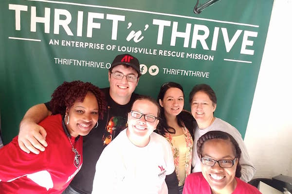 Students huddle together during Louisville trip.