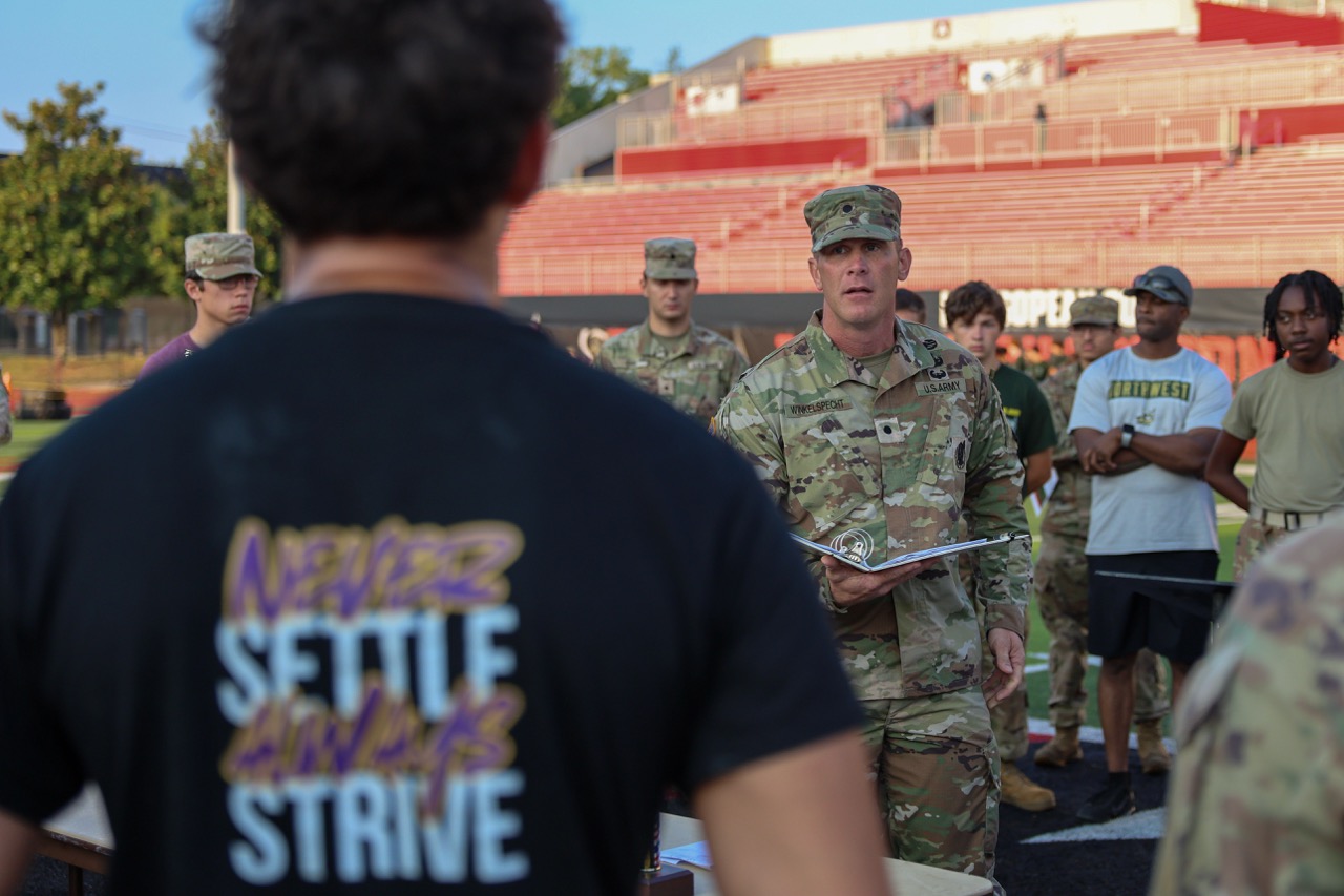 Cadet Winkelspecht delivers morning instructions for the day’s events.