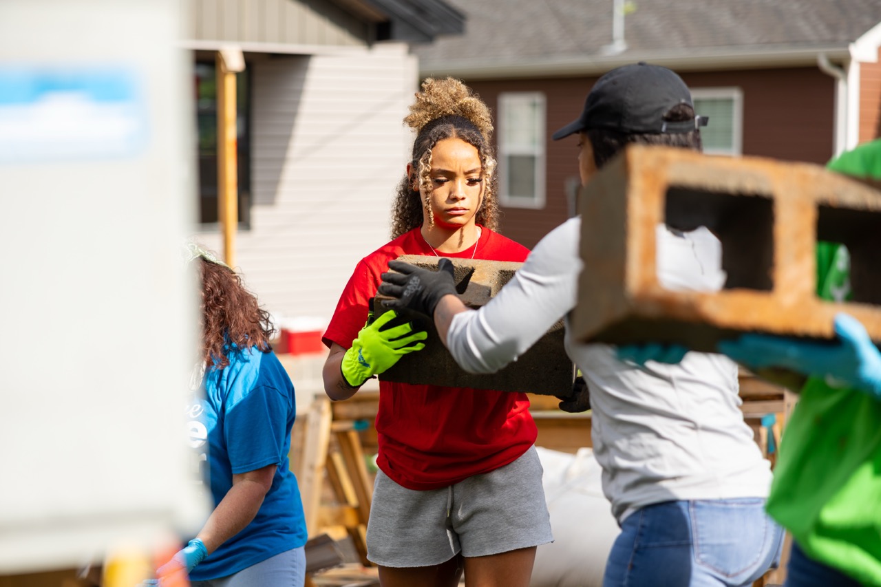 Destiny Griffin works on a service project during the internship program.