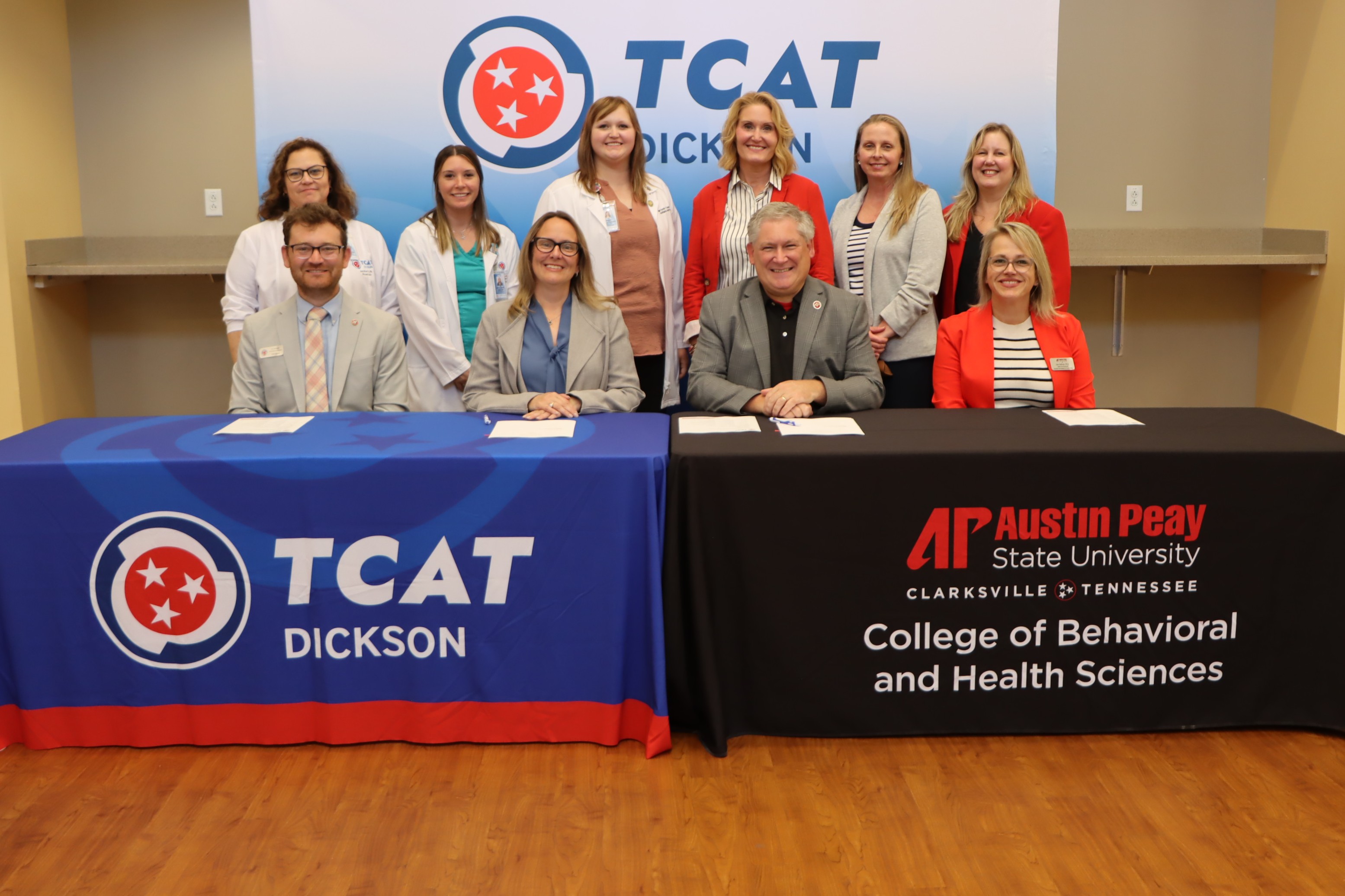 TCAT Dickson and Austin Peay State University made history by signing an articulation agreement, creating an important pathway for TCAT practical nursing students to receive 27 credit hours when enrolling in APSU’s BSN program and meeting the necessary requirements. Pictured front row from left is TCAT Dickson Vice President of Academics Dr. Levi Mayer, TCAT Dickson President Laura Travis, Austin Peay State University President Mike Licari, and Austin Peay State University Senior Vice Provost Dr. Lisa Sullivan; back from left are TCAT practical nursing Instructors Amy Wuertz, Macy Clark, and Megan Tidwell, along with APSU School of Nursing Director Dr. Eve Rice, APSU Associate Professor of Nursing Dr. Kristen Butler, and Dean of the College of Behavioral and Health Sciences Dr. Dlynn Williams.