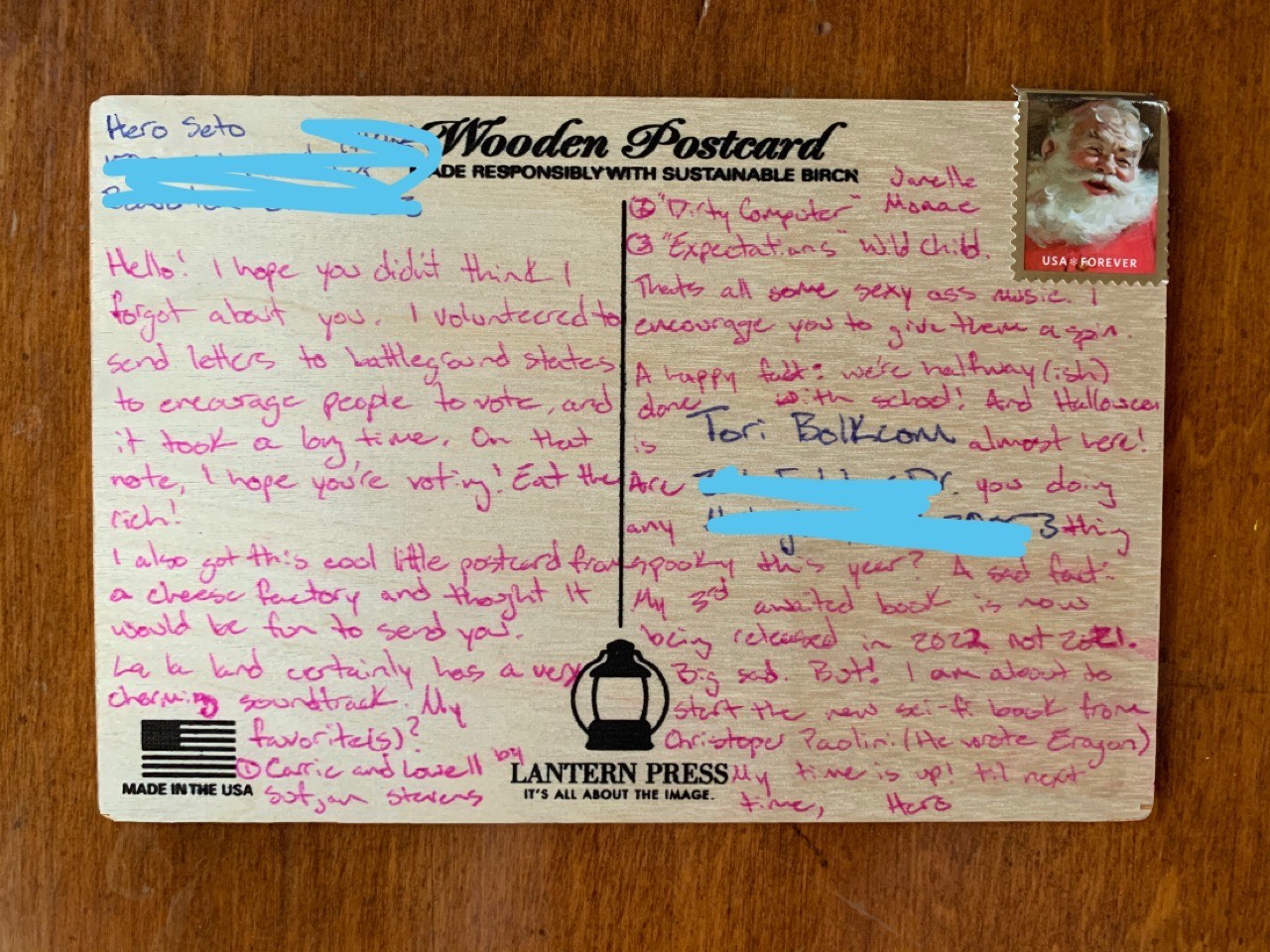 Bolkcom shared this wooden postcard she recently received from Hero Seto, a graduate student in Oregon.