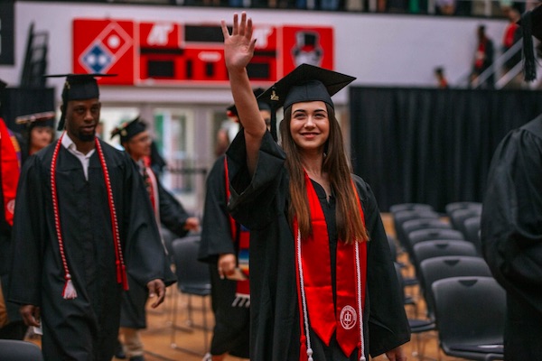 APSU student crossing stage