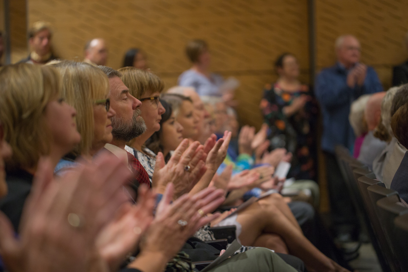 Community members at an awards ceremony.