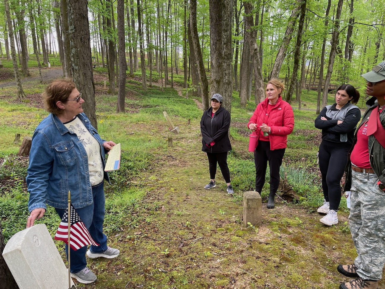 Phyllis Smith, the historian for the Mt. Olive Cemetery Historical Preservation Society, leads a tour for public health professionals from Austin Peay State University and the surrounding community. 
