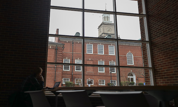 The Browning Buiding, as seen through a window in the Morgan University Center.